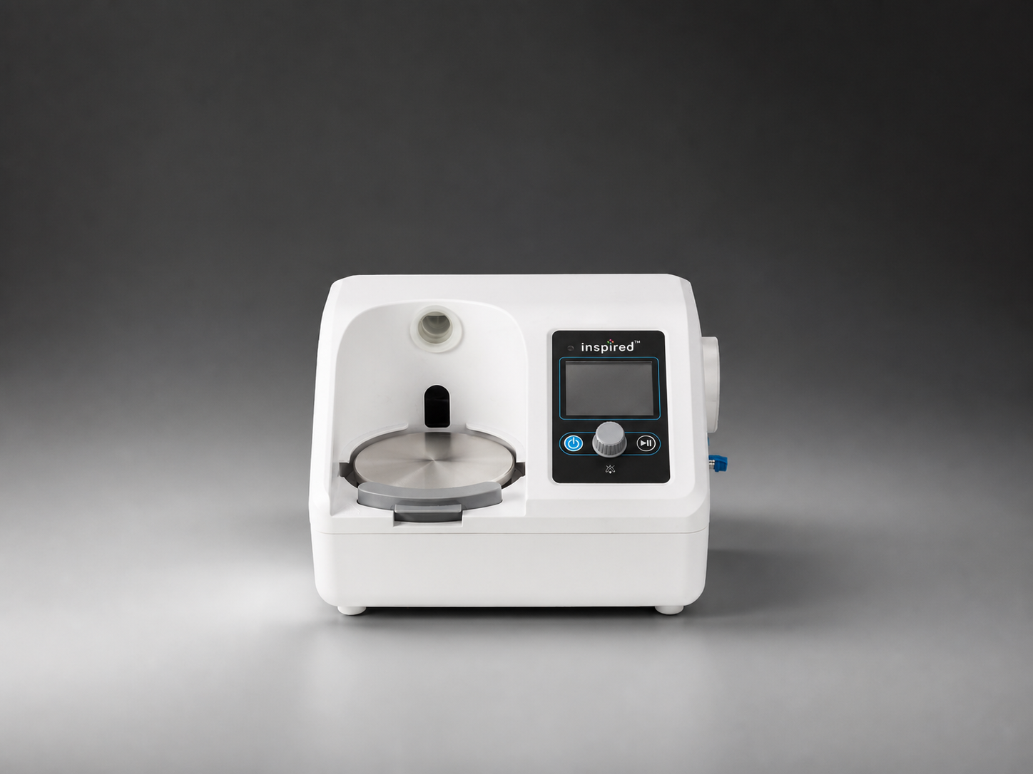 inspired O2FLO High Flow Heated Humidifier, model VUN-001, studio product photo, disconnected humidifier chamber and gas inlet port