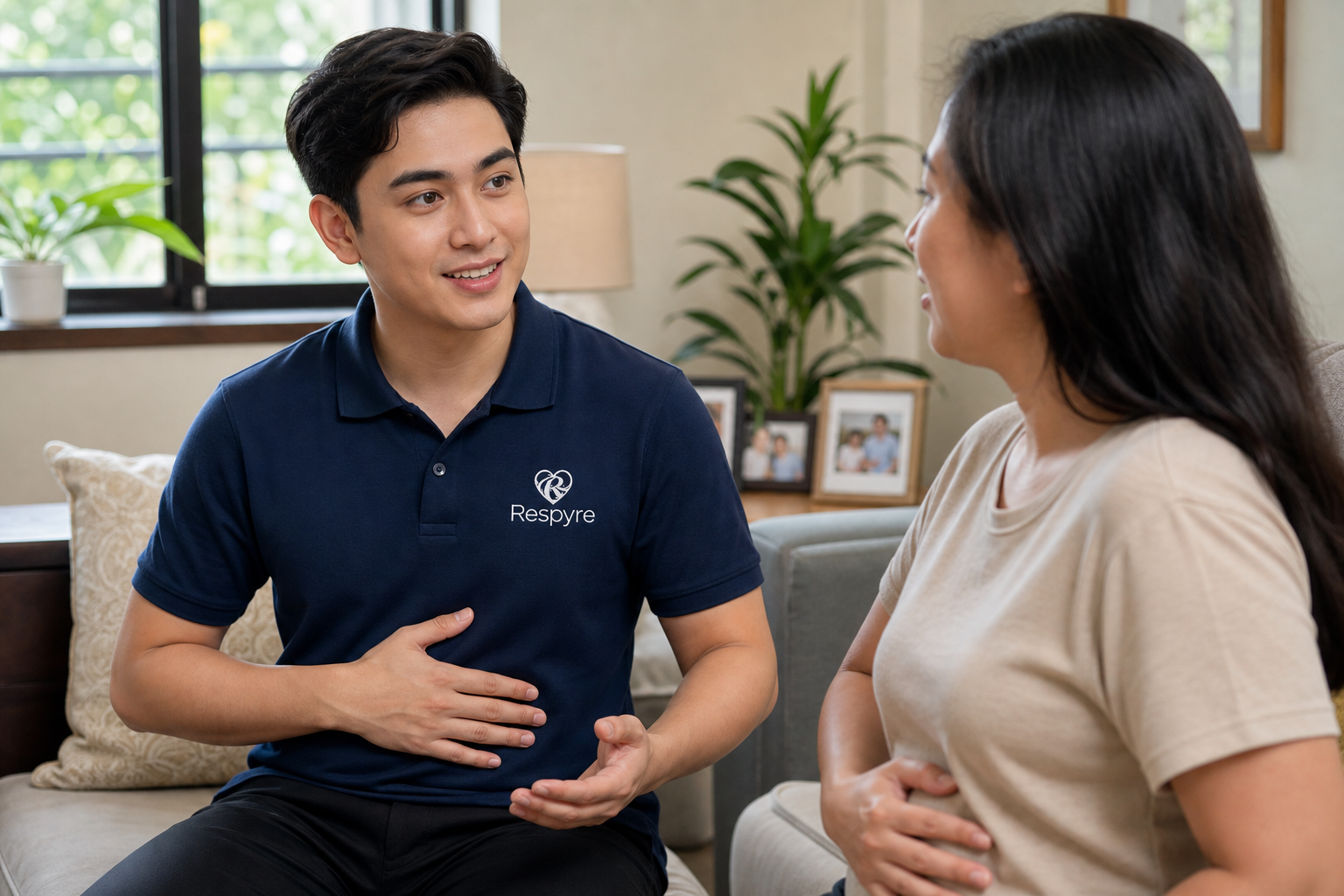 Respiratory therapist coaching a seated patient through a breathing exercise